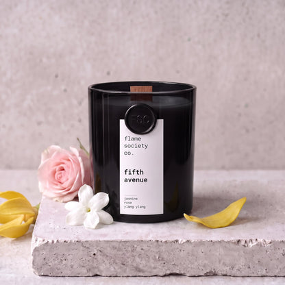 Fifth Avenue candle styled with jasmine, rose and ylang ylang on concrete — Flame Society Co.