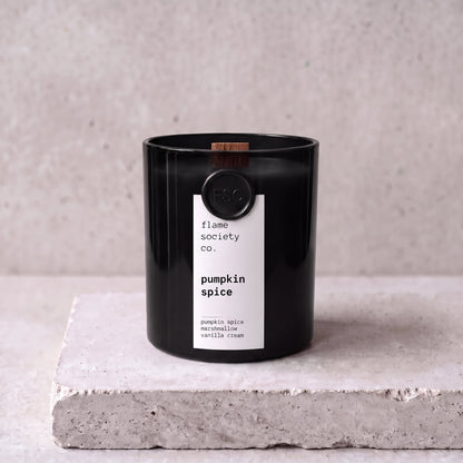 Pumpkin Spice candle hero — black glass vessel with wooden wick, pumpkin spice, marshmallow and vanilla cream — Flame Society Co.