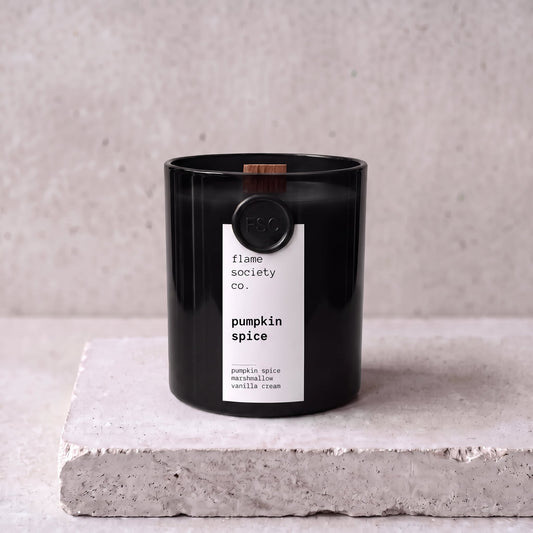Pumpkin Spice candle hero — black glass vessel with wooden wick, pumpkin spice, marshmallow and vanilla cream — Flame Society Co.