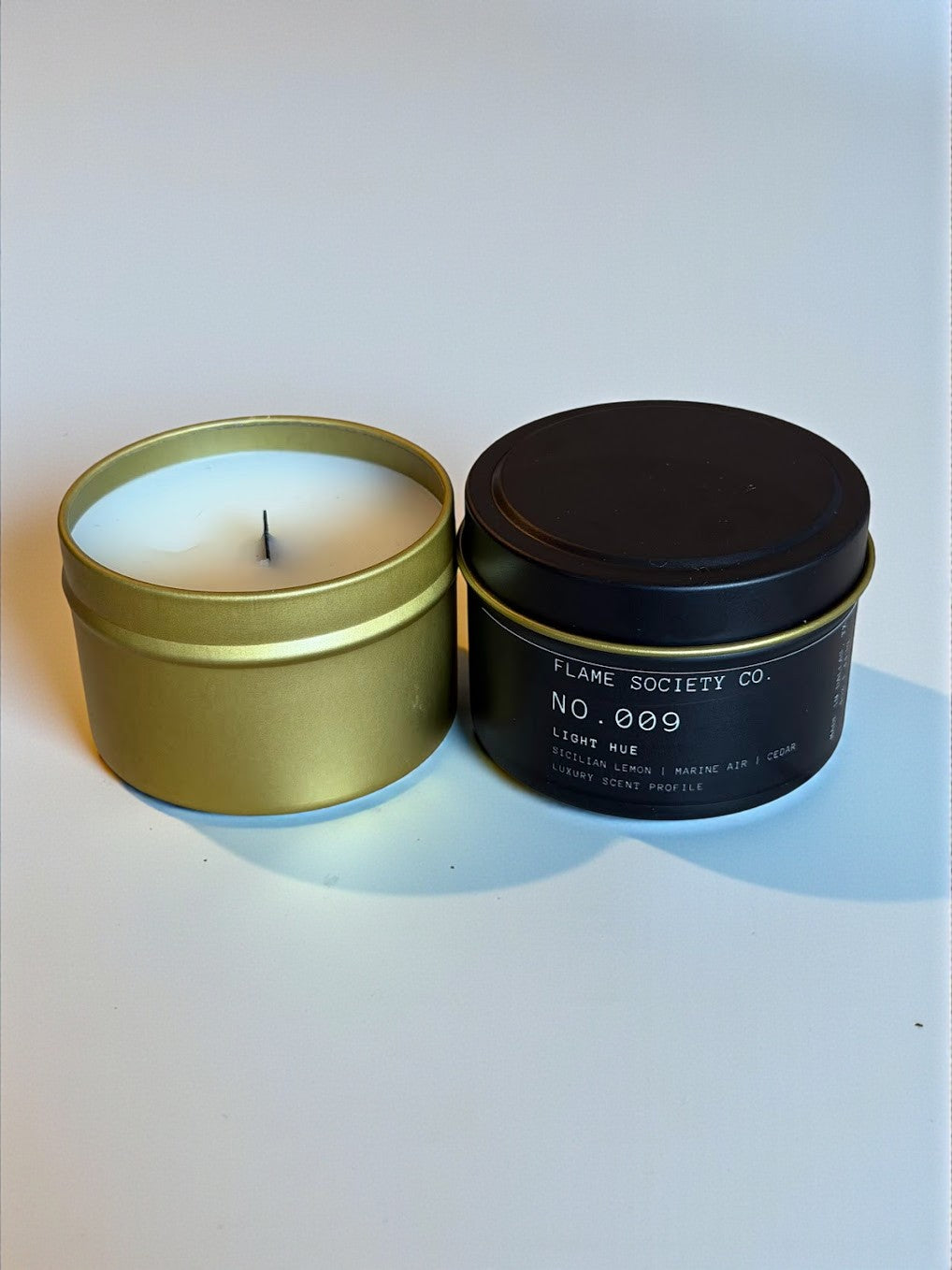 Peppermint Cream candle in matte white vessel with gold interior