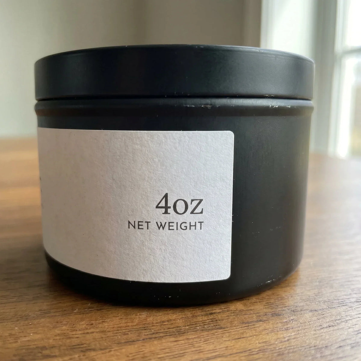 4oz mini candle in a black vessel with white label — Flame Society Co.