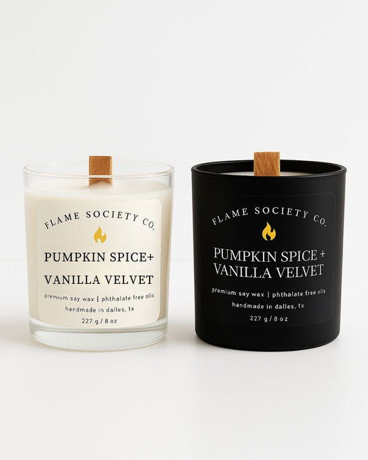 Two candles from Flame Society Co. with labels on a white background