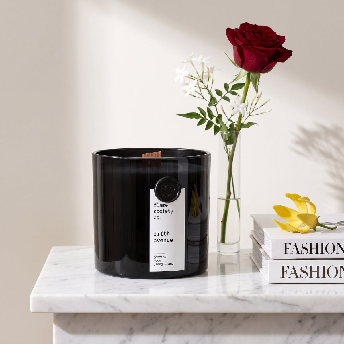 Flame Society Co. Fifth Avenue candle in black glass vessel with jasmine, roses and ylang ylang.