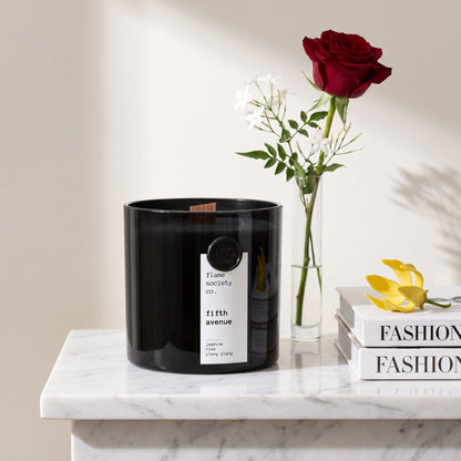 Flame Society Co. Fifth Avenue candle in black glass vessel with jasmine, roses and ylang ylang.