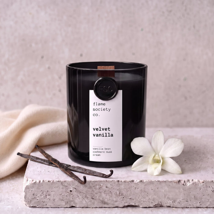 Velvet Vanilla candle styled with vanilla, orchid and cashmere on concrete — Flame Society Co.