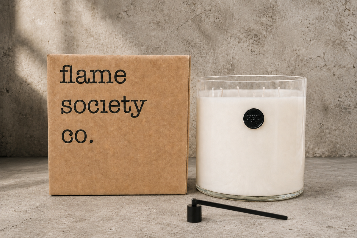Big + Bougie XL 150oz statement candle with branded box and black wick snuffer — what's included